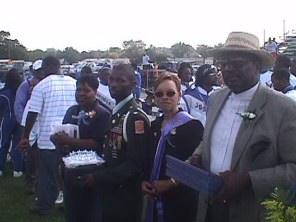 C/MAJ Miles escorting Ms. Britt accompanied also by Mrs. Williams and Mr. Brazil.